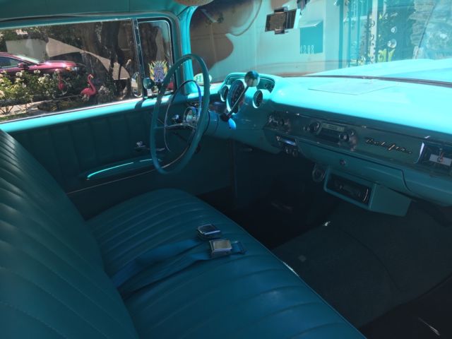 1957 turquoise and India Ivory Chevrolet Bel Air/150/210 sedan