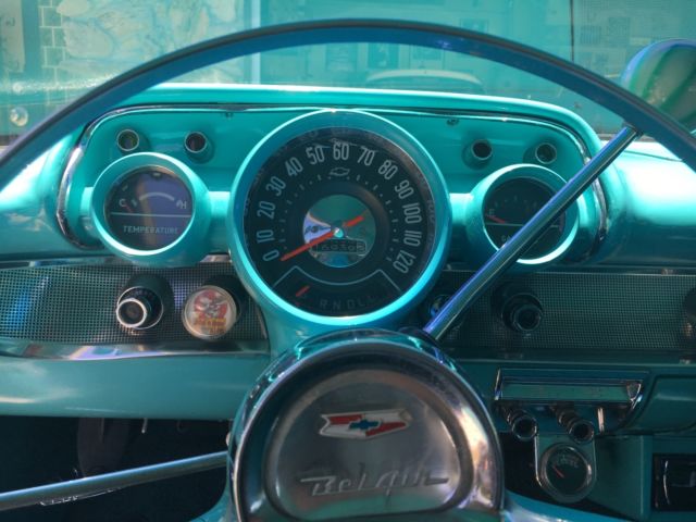 1957 turquoise and India Ivory Chevrolet Bel Air/150/210 sedan