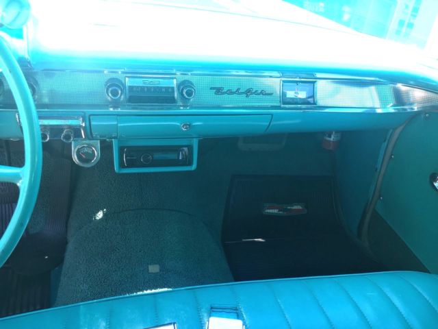 1957 turquoise and India Ivory Chevrolet Bel Air/150/210 sedan