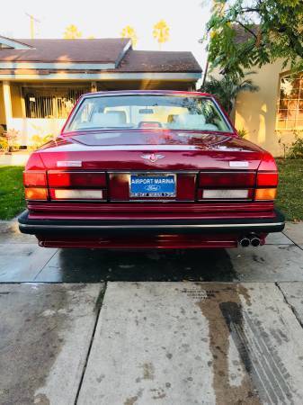 1991 Red Ford Mustang Sedan