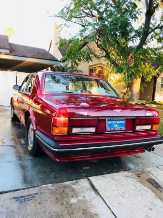 1991 Red Ford Mustang Sedan