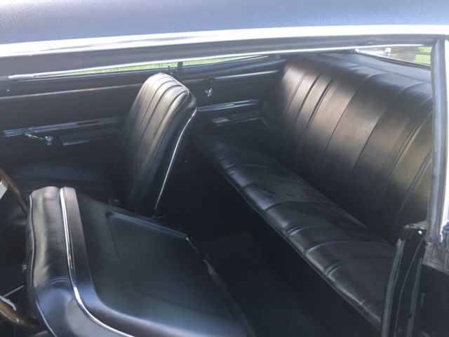 1966 black Chevrolet Chevelle Coupe