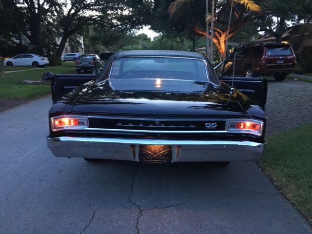1966 black Chevrolet Chevelle Coupe