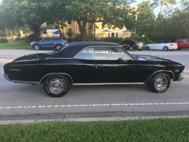 1966 black Chevrolet Chevelle Coupe