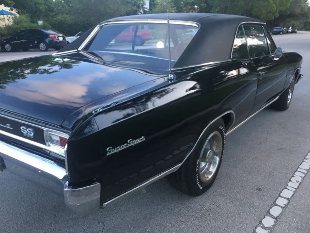 1966 black Chevrolet Chevelle Coupe