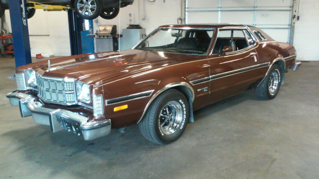 1976 brown Ford Torino Coupe