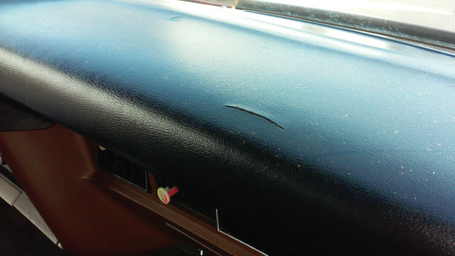 1976 brown Ford Torino Coupe