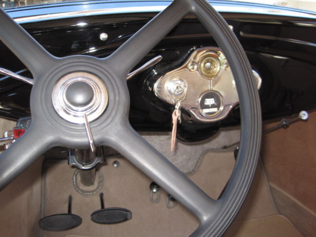 1930 black and Gold Ford Model A Tudor Sedan
