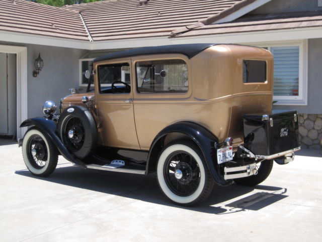 1930 black and Gold Ford Model A Tudor Sedan