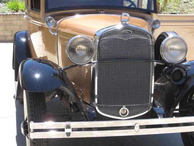 1930 black and Gold Ford Model A Tudor Sedan