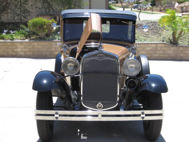 1930 black and Gold Ford Model A Tudor Sedan