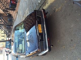 1994 Black/Purple Jaguar XJ12 Sedan