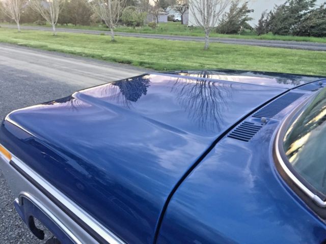 1977 Blue and Silver Ford F-250 Standard Cab Pickup