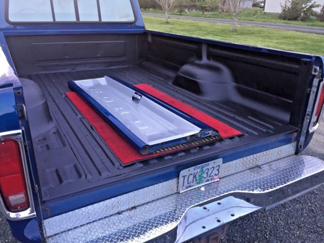 1977 Blue and Silver Ford F-250 Standard Cab Pickup