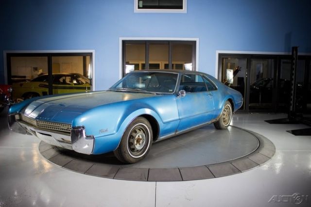 1967 Blue Oldsmobile Toronado
