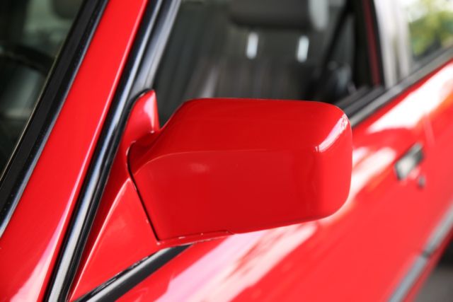 1990 red BMW 3-Series Sedan