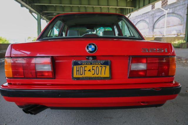1990 red BMW 3-Series Sedan