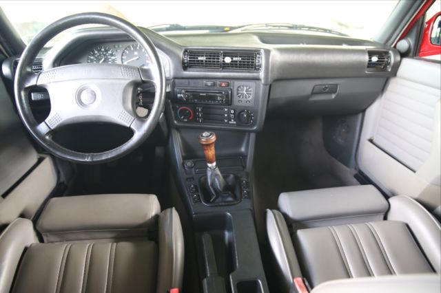 1990 red BMW 3-Series Sedan