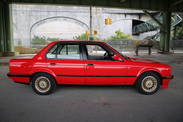 1990 red BMW 3-Series Sedan