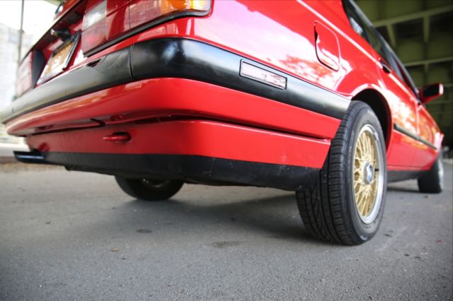1990 red BMW 3-Series Sedan