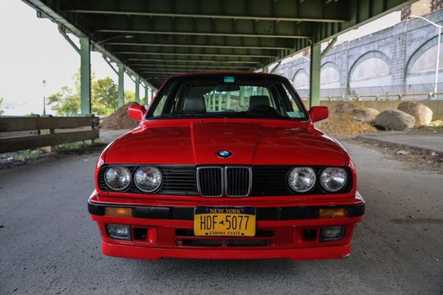 1990 red BMW 3-Series Sedan