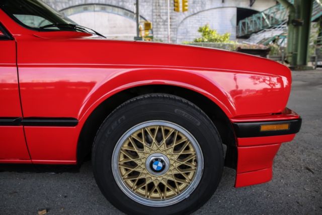 1990 red BMW 3-Series Sedan