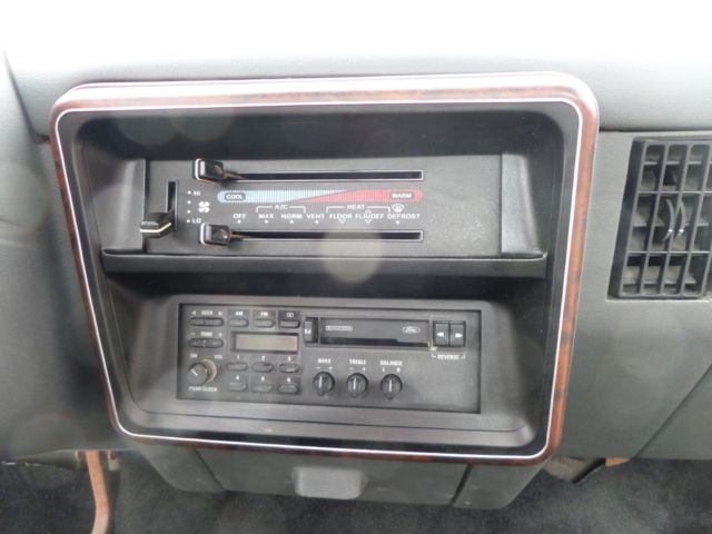 1990 Silver/Black Ford F-150 Standard Cab Pickup