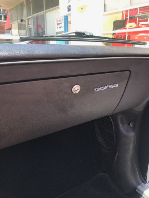 1965 Red Chevrolet Corvair Convertible