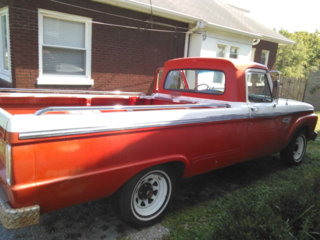 1966 Red and white Ford F-100 Long Bed