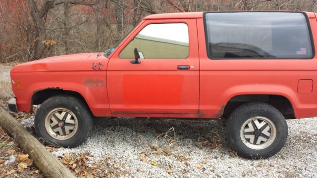1986 Red Ford Bronco SUV