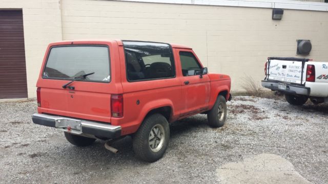 1986 Red Ford Bronco SUV