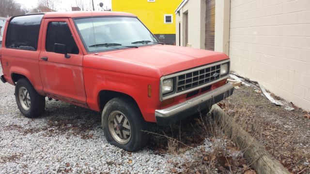 1986 Red Ford Bronco SUV