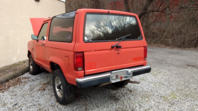 1986 Red Ford Bronco SUV