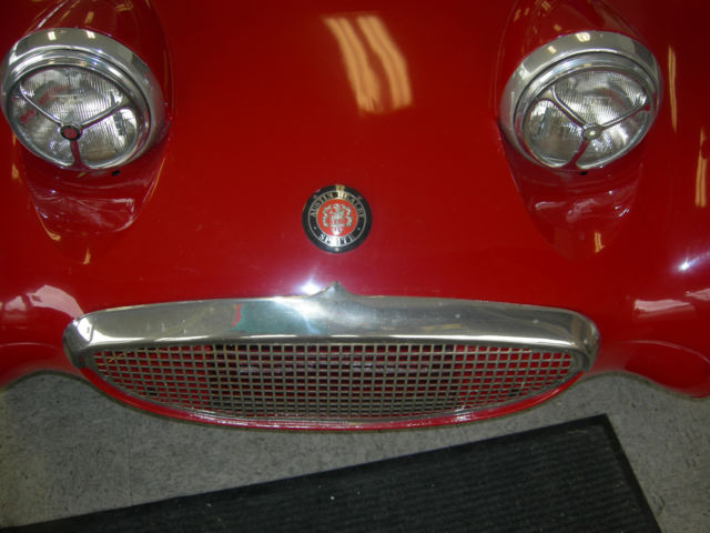 1973 red Austin Healey Sprite convertible