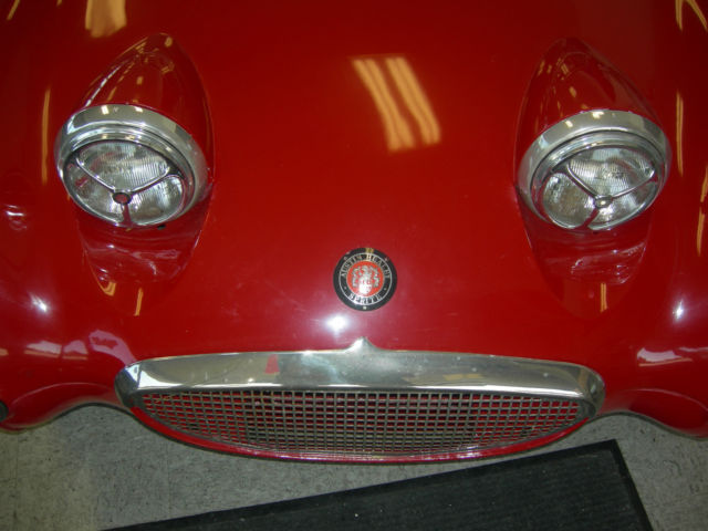 1973 red Austin Healey Sprite convertible