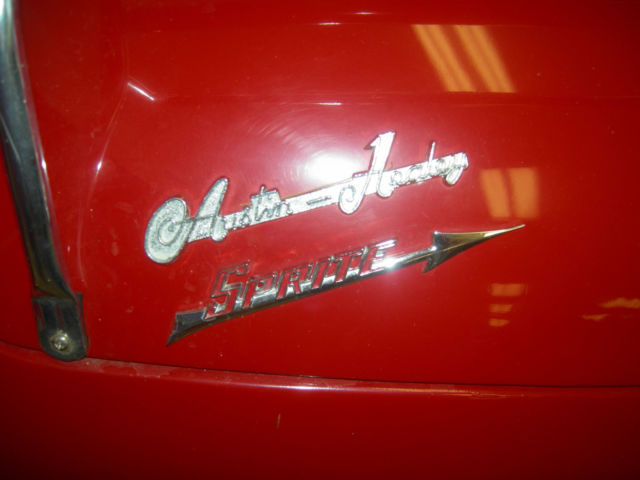 1973 red Austin Healey Sprite convertible