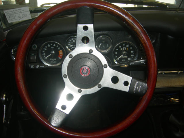 1973 red Austin Healey Sprite convertible