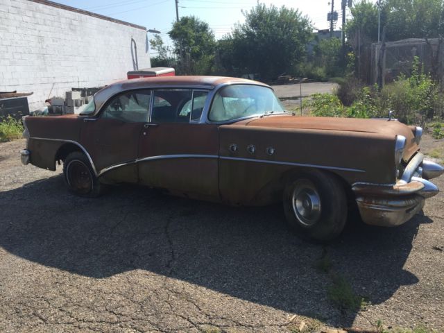 1955 rust Buick 4 door pillarless 4 door 