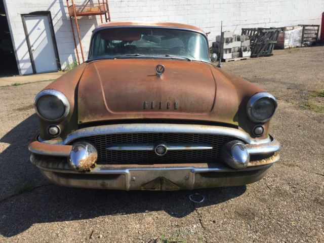 1955 rust Buick 4 door pillarless 4 door 