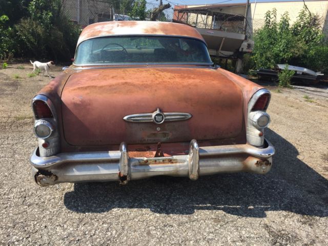 1955 rust Buick 4 door pillarless 4 door 
