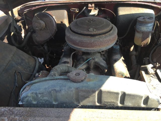 1955 rust Buick 4 door pillarless 4 door 