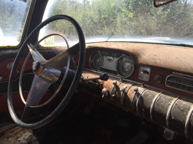 1955 rust Buick 4 door pillarless 4 door 