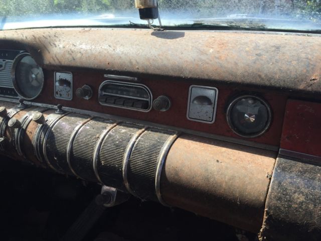 1955 rust Buick 4 door pillarless 4 door 