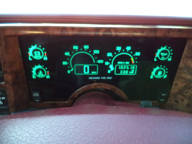 1990 Red Buick Riviera Coupe