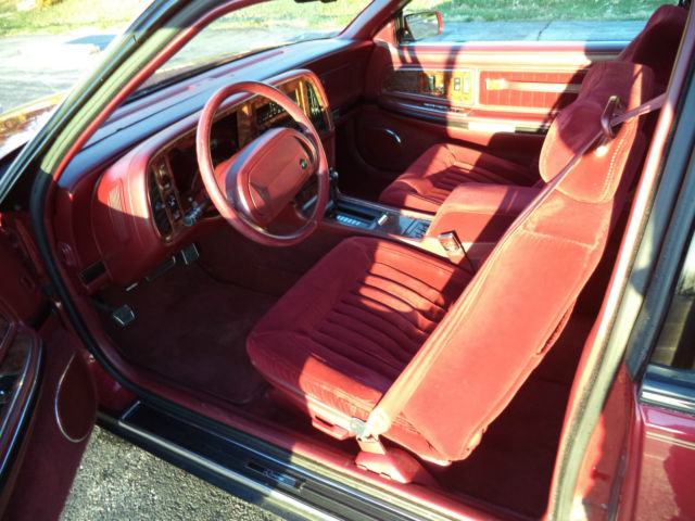 1990 Red Buick Riviera Coupe