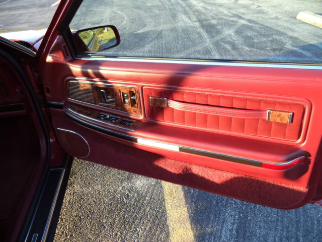 1990 Red Buick Riviera Coupe