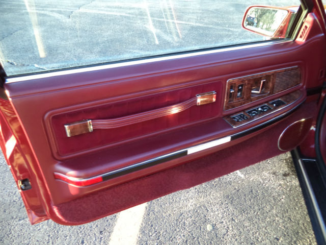 1990 Red Buick Riviera Coupe