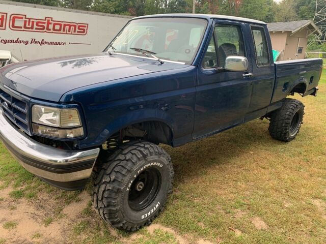 1993 Blue Ford F-150 Crew Cab Pickup