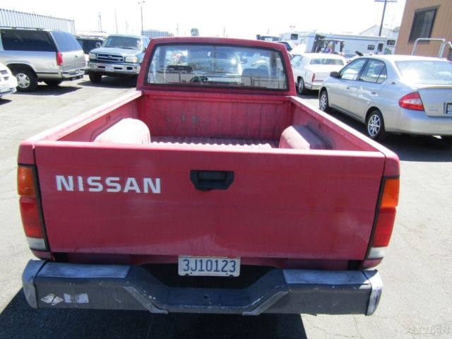 1987 Red Nissan Truck