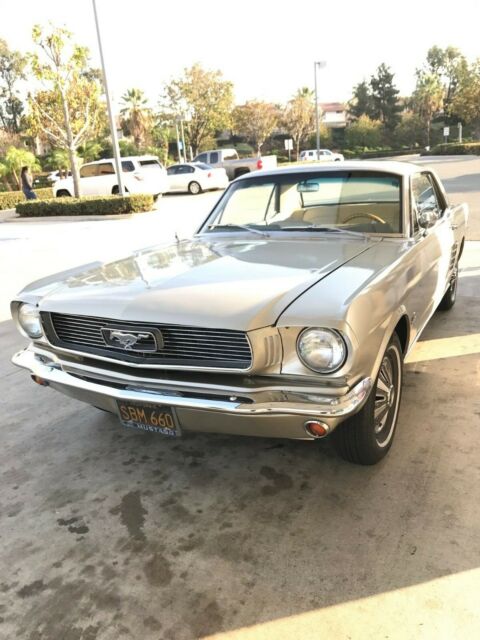 1966 beige Ford Mustang Coupe